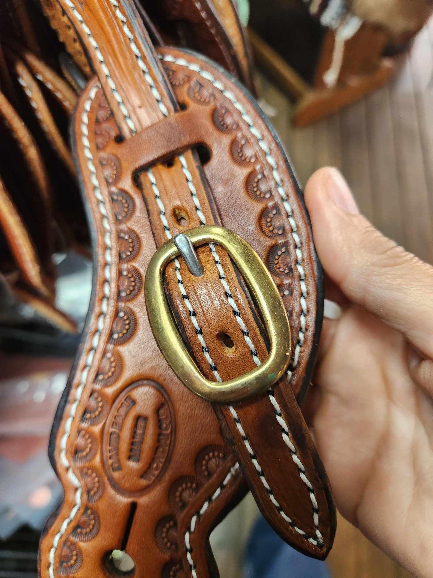 Spur straps tooled