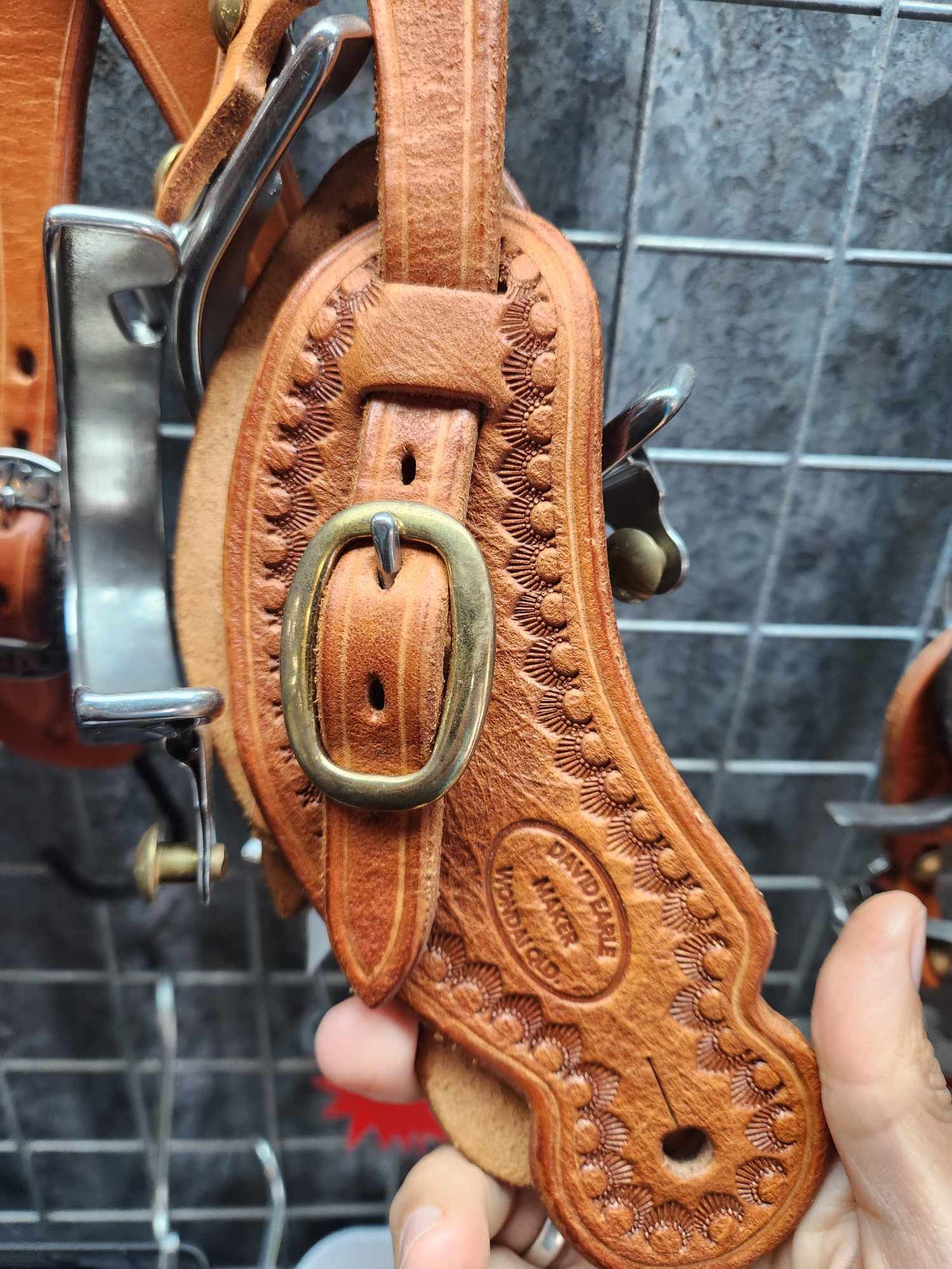 Spur straps tooled